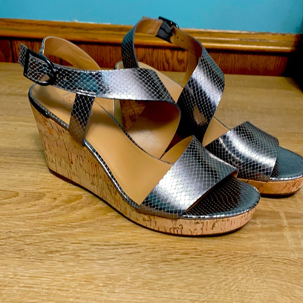 NWOT Franco Sarto silver wedge sandals.